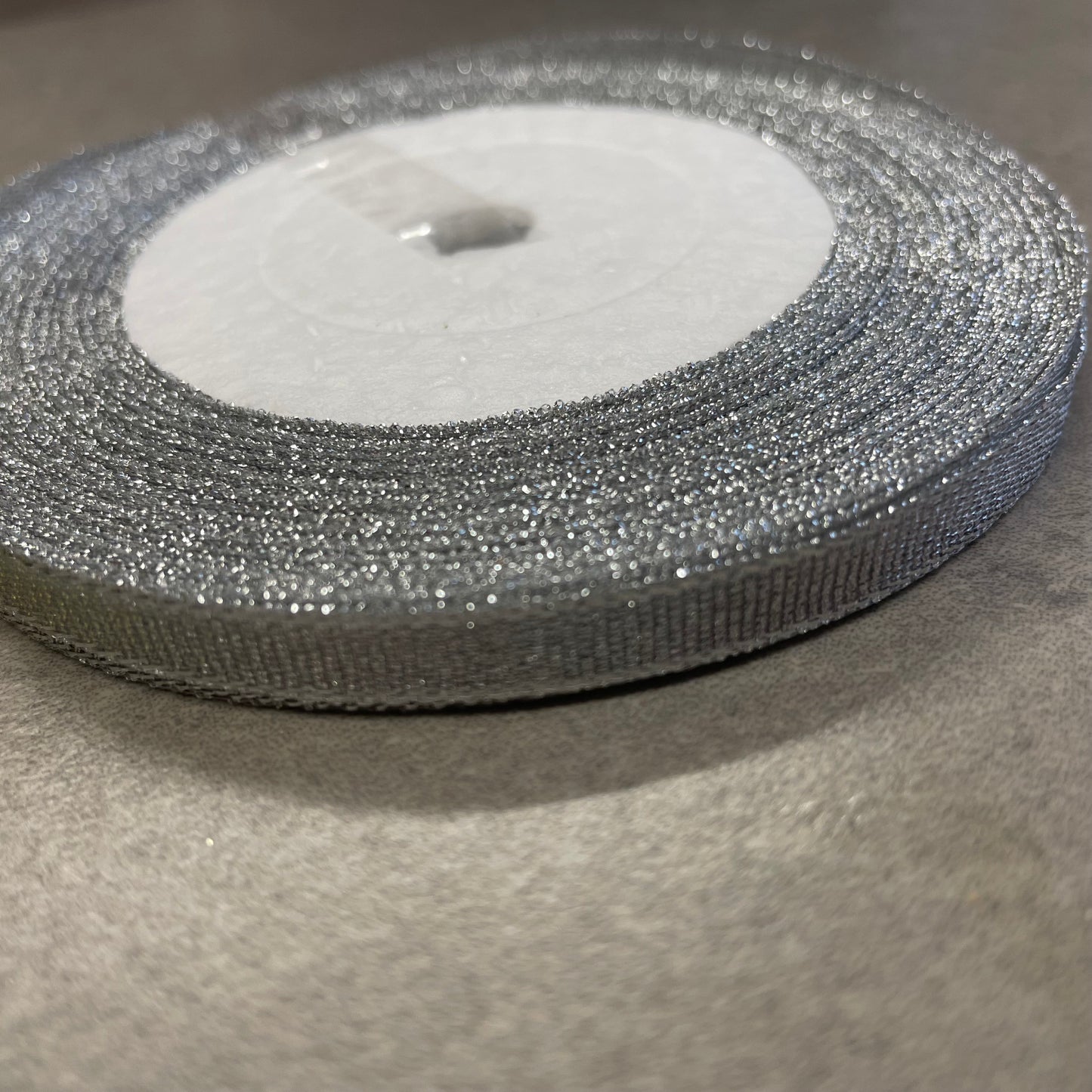 22 meter roll of Silver Glitter organza 6mm Ribbon