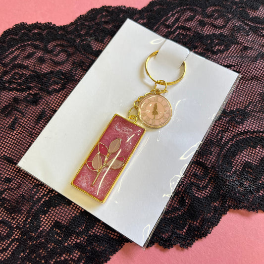 Pink floral Resin Keyring with Alice in Wonderland Charm