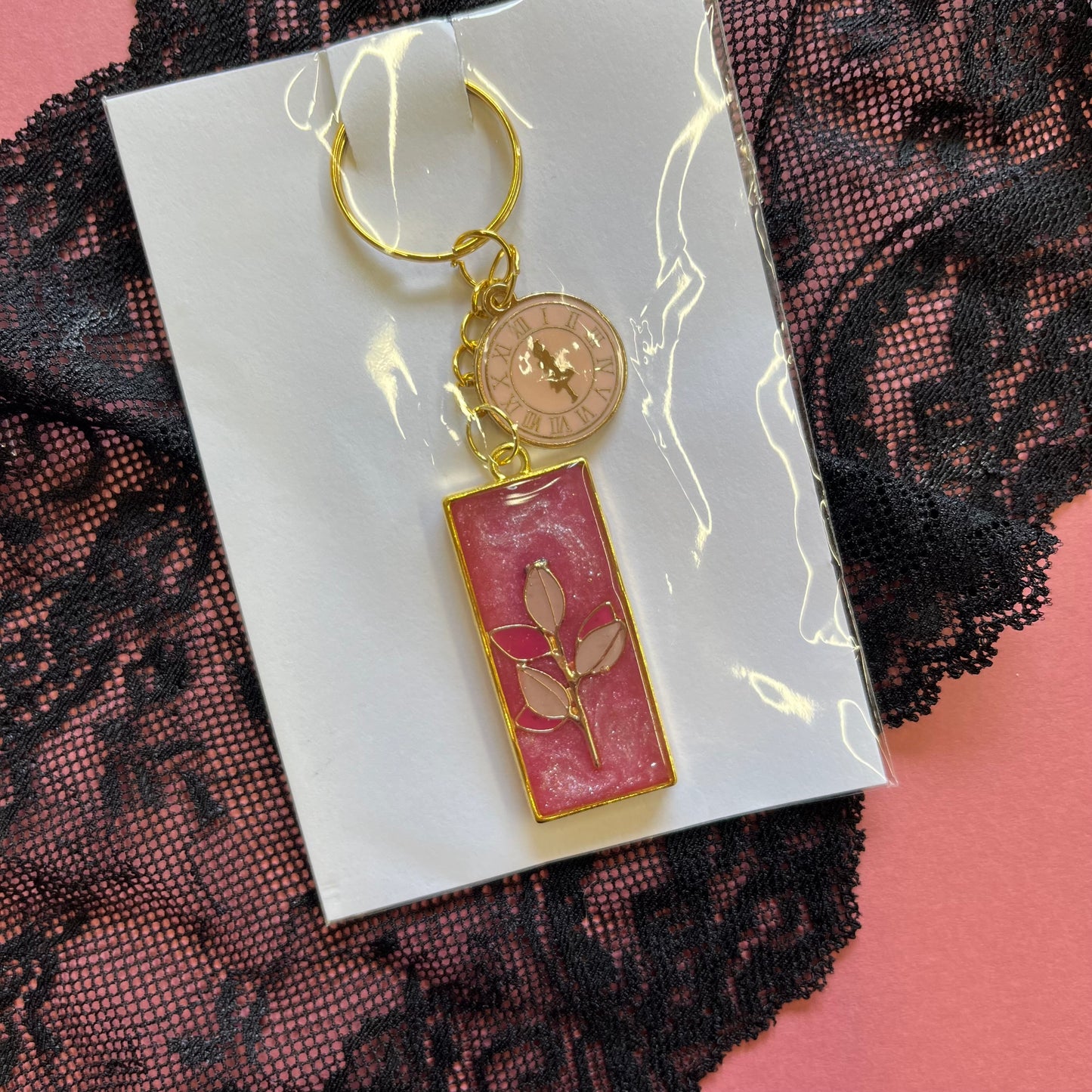 Pink floral Resin Keyring with Alice in Wonderland Charm