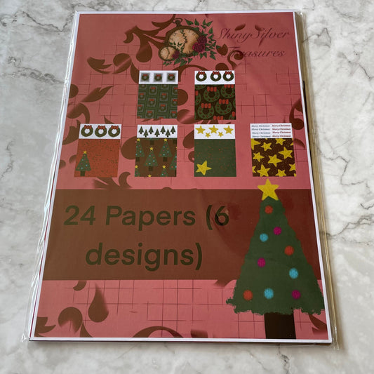 Feastive treasures Christmas paper pad contains 24 A4 sheets (6 designs) of beautiful Christmas backgrounds with added ephemera